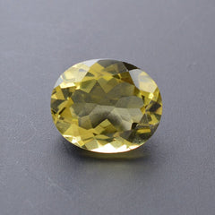 OLIVE QUARTZ CUT OVAL 12X10MM 4.42 Cts.