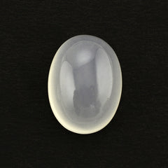 OFF WHITE CALCITE OVAL CAB 20X15MM 21.15 Cts.