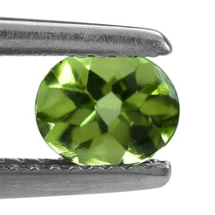 PERIDOT BUFFTOP OVAL (CLEAN) 6X5MM 0.66 Cts.