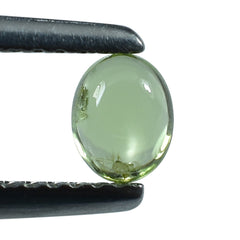 PERIDOT OVAL CAB 5X4MM 0.38 Cts.