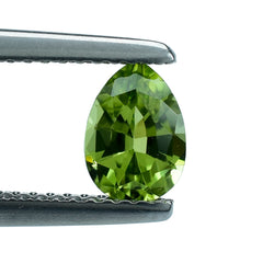PERIDOT STEP CUT (GREEN/CLEAN) PEAR 7.00X5.00 MM 0.76 Cts.