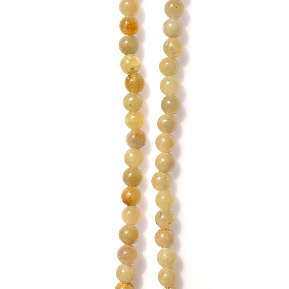 YELLOW SAPPHIRE PLAIN BALLS 6.00MM 8" PER LINE 77.03 Cts.