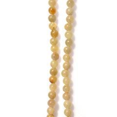 YELLOW SAPPHIRE PLAIN BALLS 6.00MM 8" PER LINE 77.03 Cts.