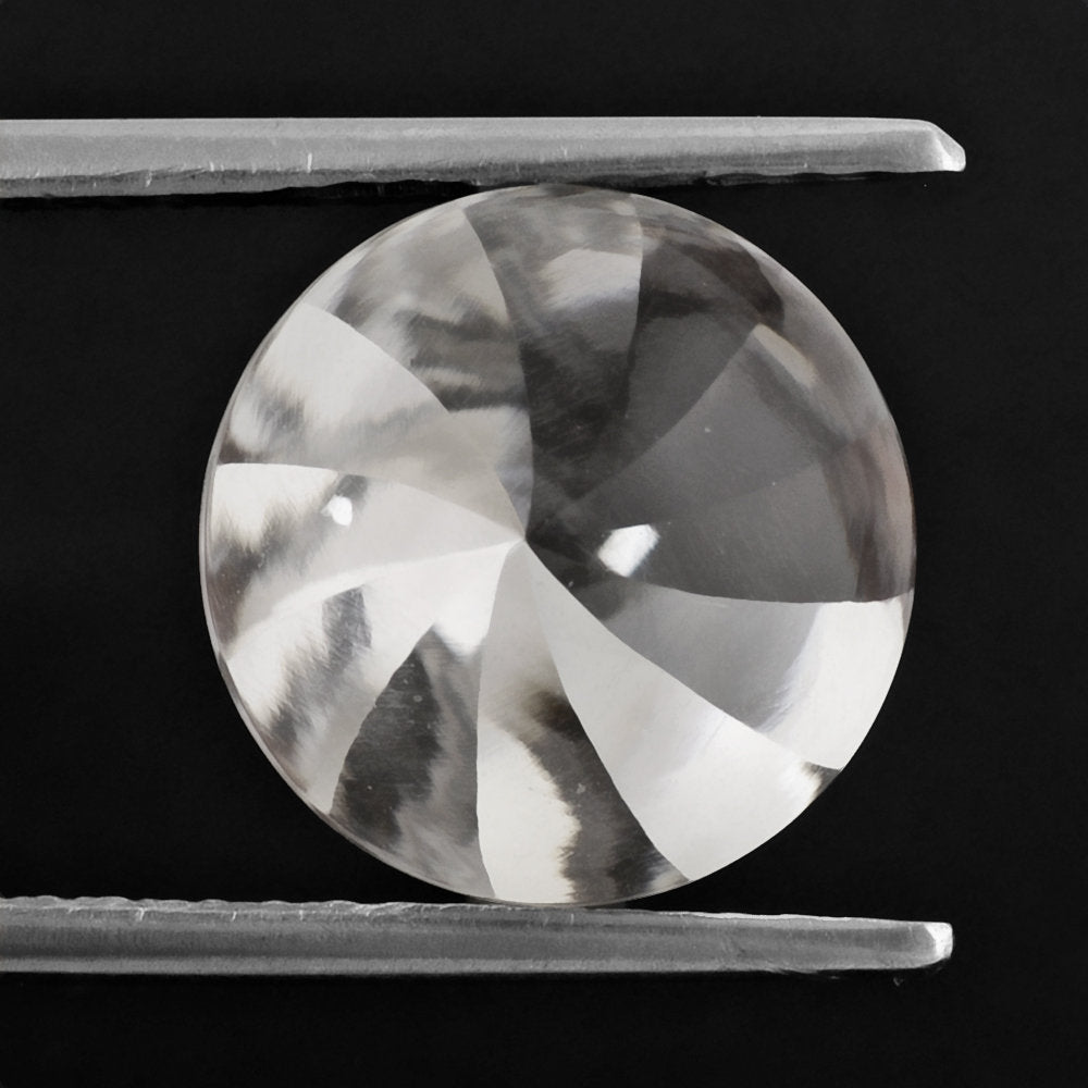 CRYSTAL BUFFTOP ROUND WITH TWISTED CONCAVE (DES#31) 12MM 5.30 Cts.