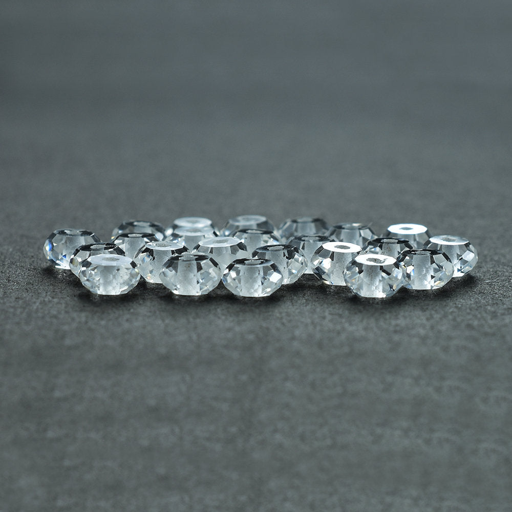 CRYSTAL QUARTZ FACETED ROUNDEL BEADS (FULL DRILL 1.00MM) 5X5MM 0.51 Cts.