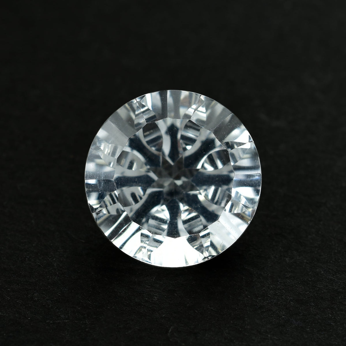 CRYSTAL ROCK QUARTZ CONCAVE CUT ROUND (WHITE)(CLEAN) 12.00X12.00 MM 5.49 CTS