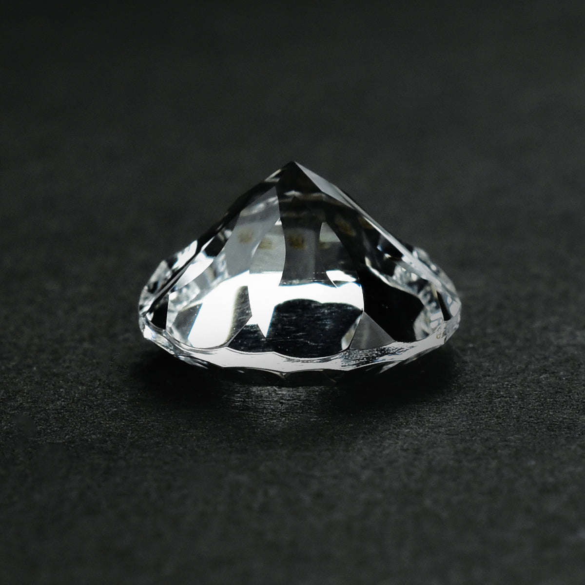 CRYSTAL ROCK QUARTZ CONCAVE CUT ROUND (WHITE)(CLEAN) 12.00X12.00 MM 5.49 CTS