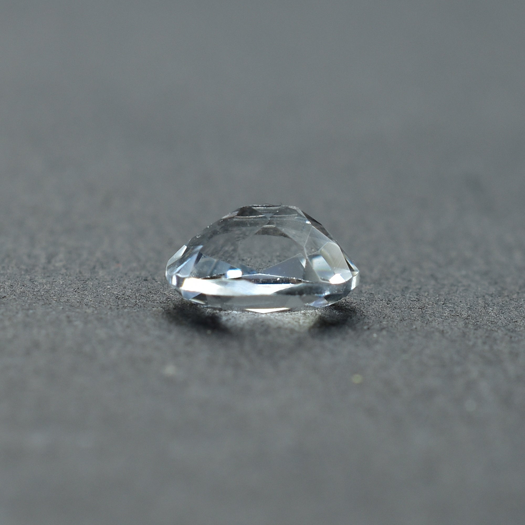 CRYSTAL ROCK QUARTZ CUT OVAL (CLEAN) 7.00X5.00 MM 0.93 CTS