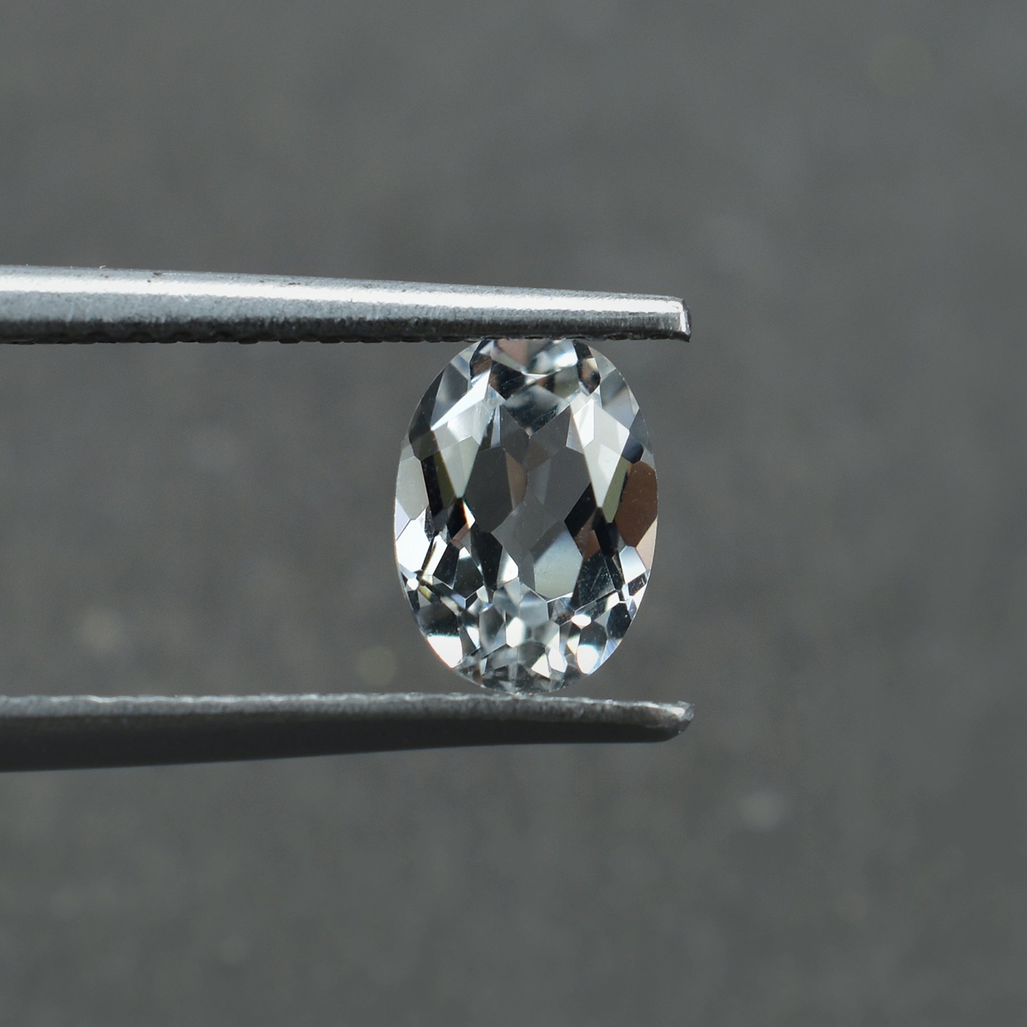 CRYSTAL ROCK QUARTZ CUT OVAL (CLEAN) 7.00X5.00 MM 0.93 CTS