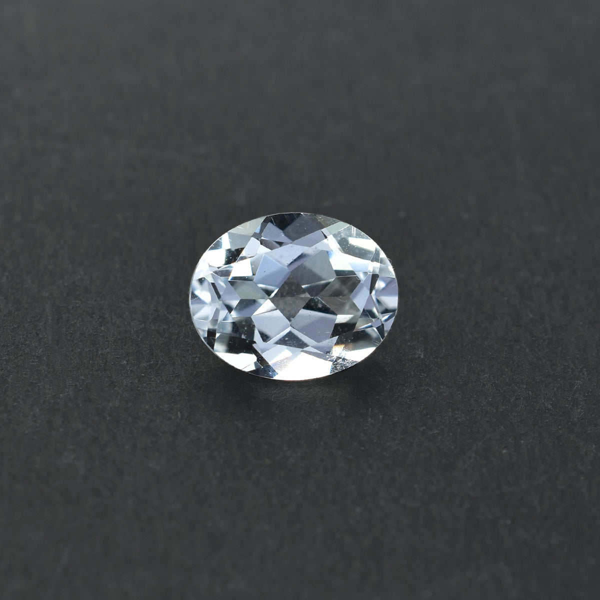 CRYSTAL ROCK QUARTZ CUT OVAL (CLEAN) 10.00X8.00 MM 3.30 CTS
