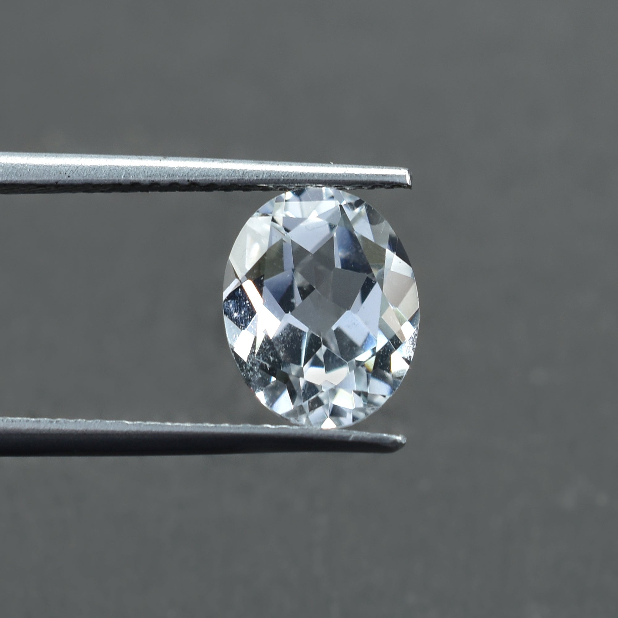 CRYSTAL ROCK QUARTZ CUT OVAL (CLEAN) 10.00X8.00 MM 3.30 CTS