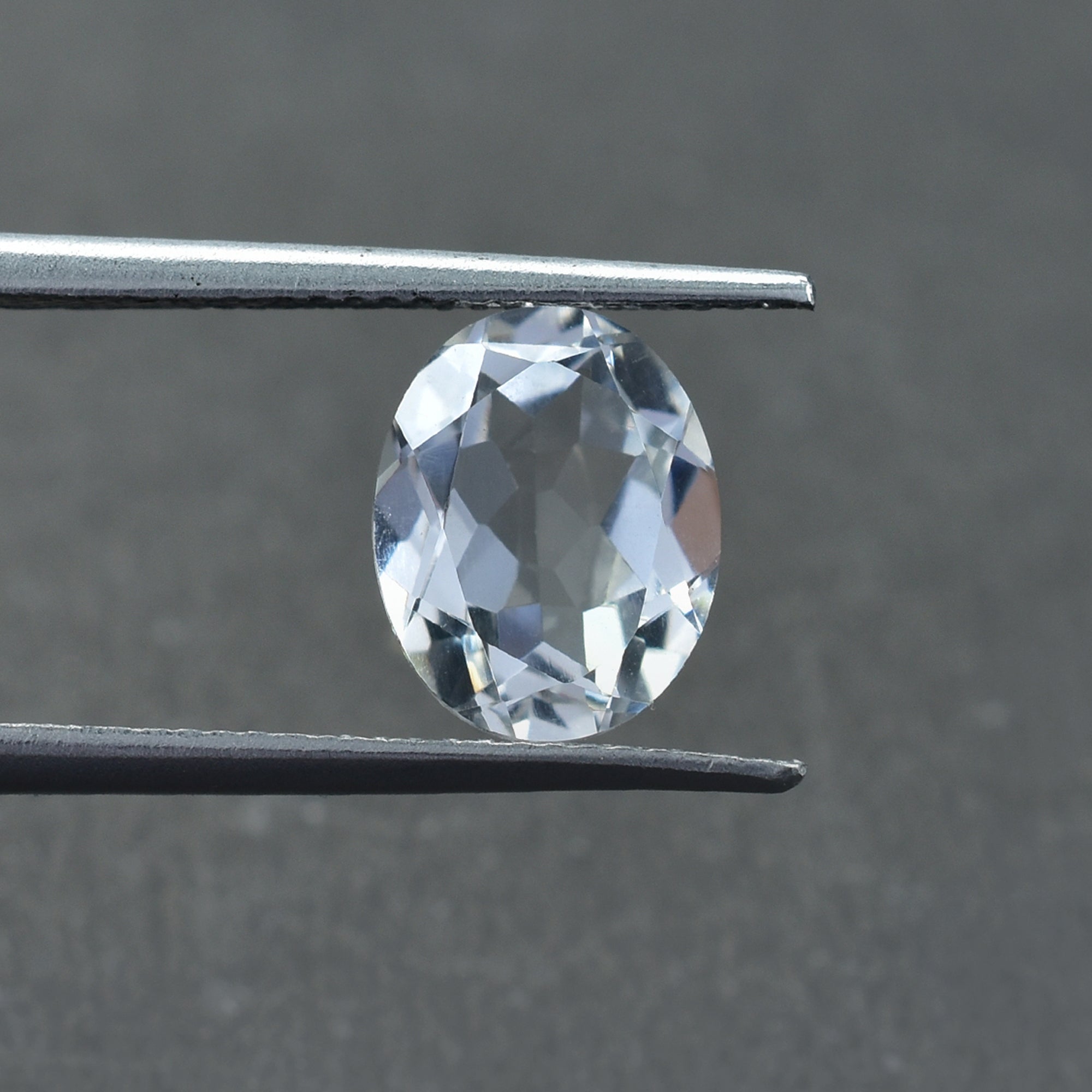 CRYSTAL ROCK QUARTZ CUT OVAL (CLEAN) 10.00X8.00 MM 2.45 CTS