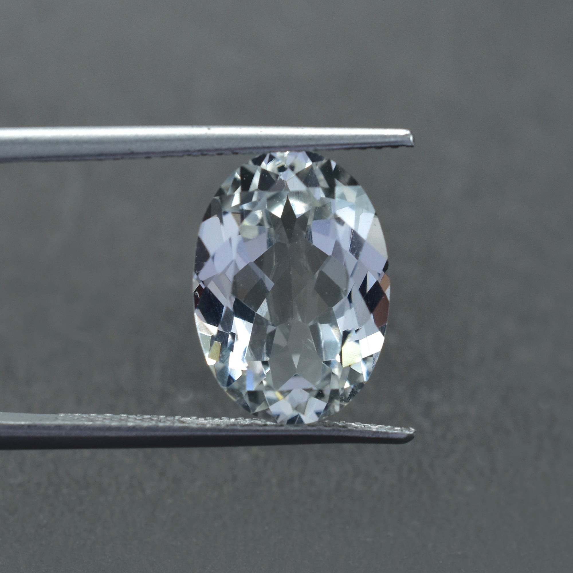 CRYSTAL ROCK QUARTZ CUT OVAL (SI) 14.00X10.00 MM 6.95 CTS