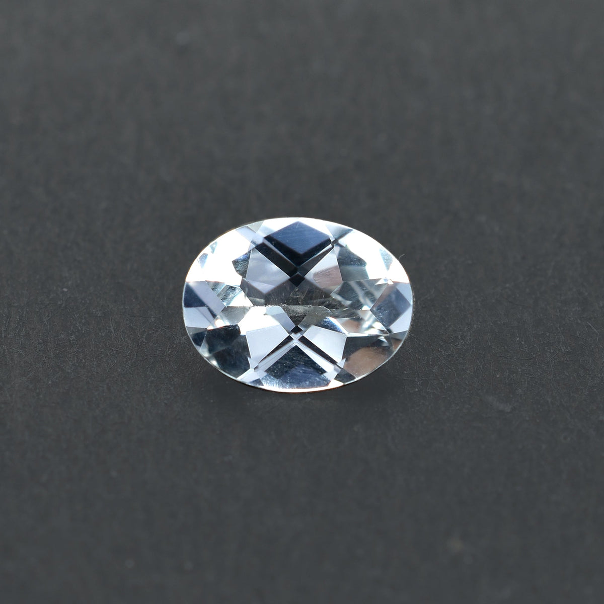 CRYSTAL ROCK QUARTZ CHECKER TOP CUT OVAL 8.00X6.00 MM 1.29 CTS