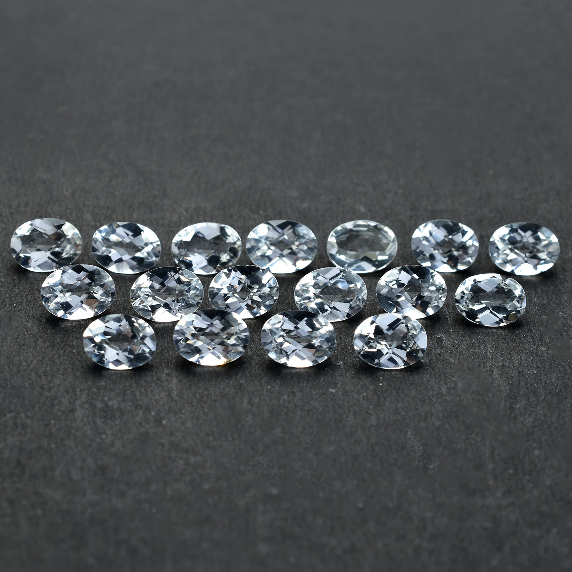 CRYSTAL ROCK QUARTZ CHECKER TOP CUT OVAL 8.00X6.00 MM 1.29 CTS