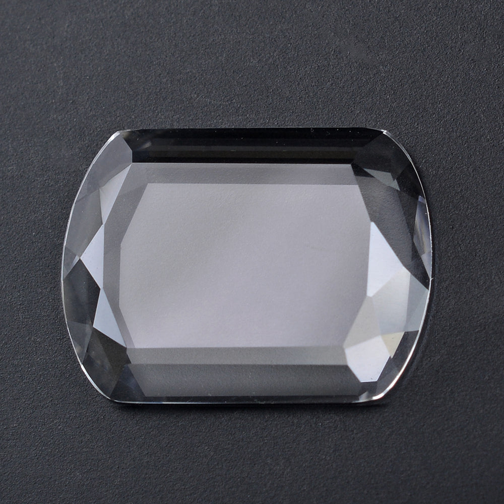 CRYSTAL TABLE CUT FLAT BOTTOM SHIELD CAB 20X15MM 9.68 Cts.
