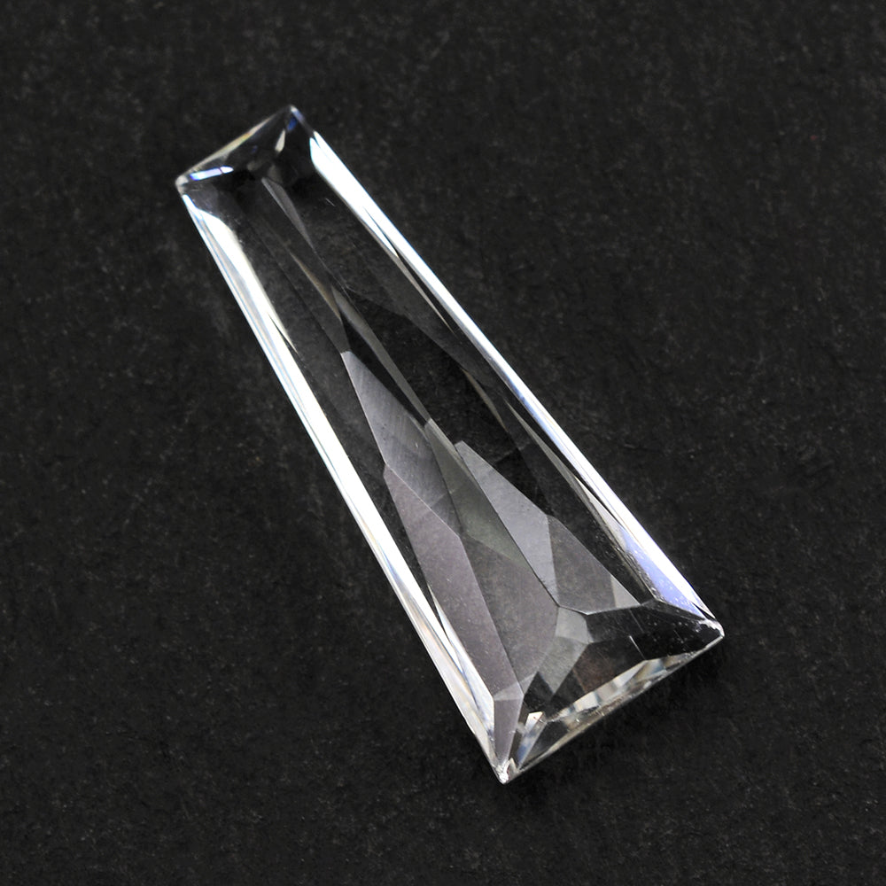 CRYSTAL PRINCESS CUT TAPER 21X8X5MM 5.77 Cts.