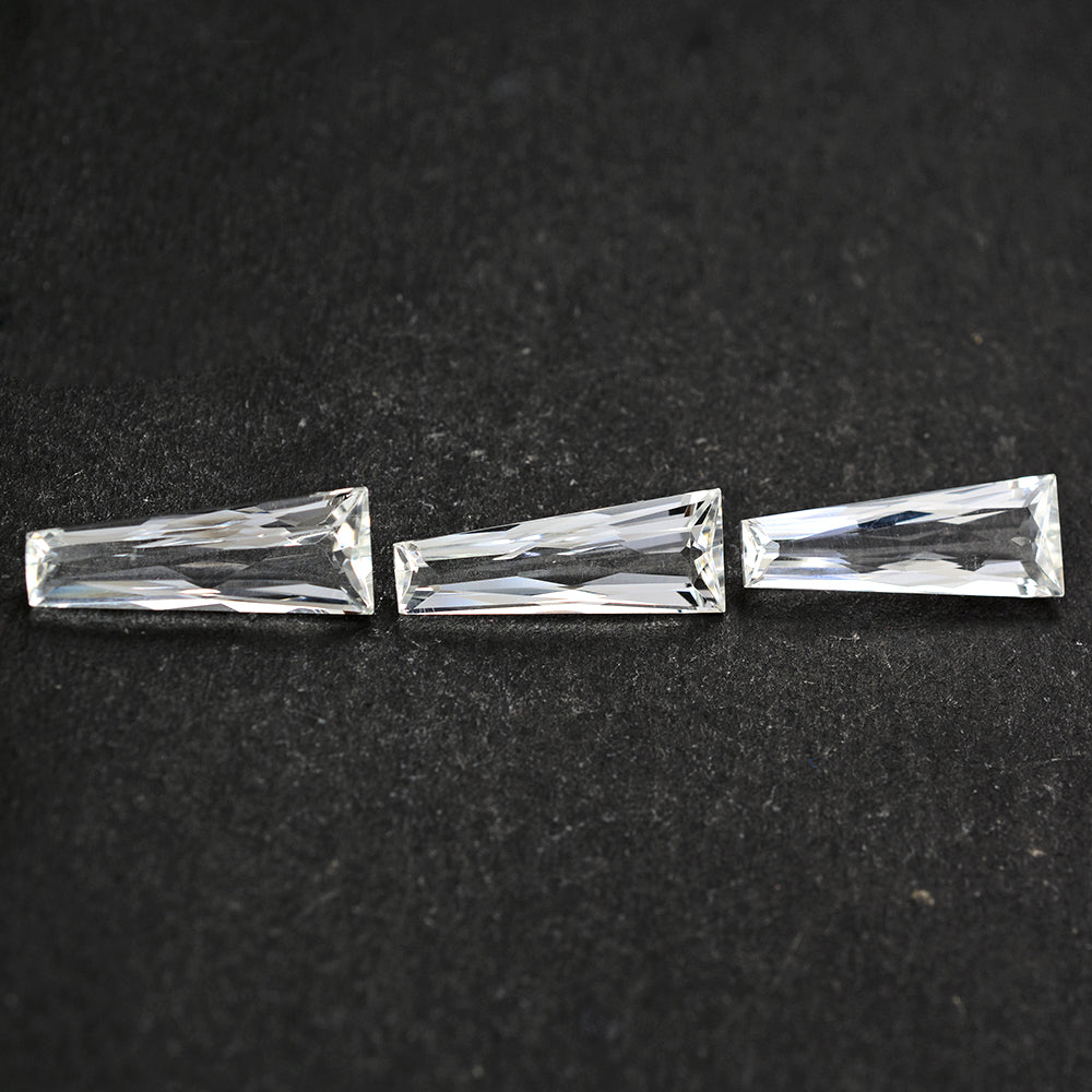 CRYSTAL PRINCESS CUT TAPER 21X8X5MM 5.77 Cts.