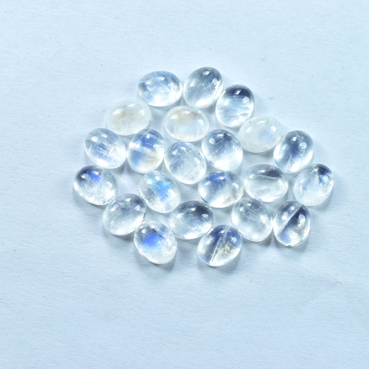 RAINBOW MOONSTONE PLAIN OVAL CAB (SEMI CLOUDY)(NICE BLUE SHINE) 10.00X8.00 MM 2.65 Cts.