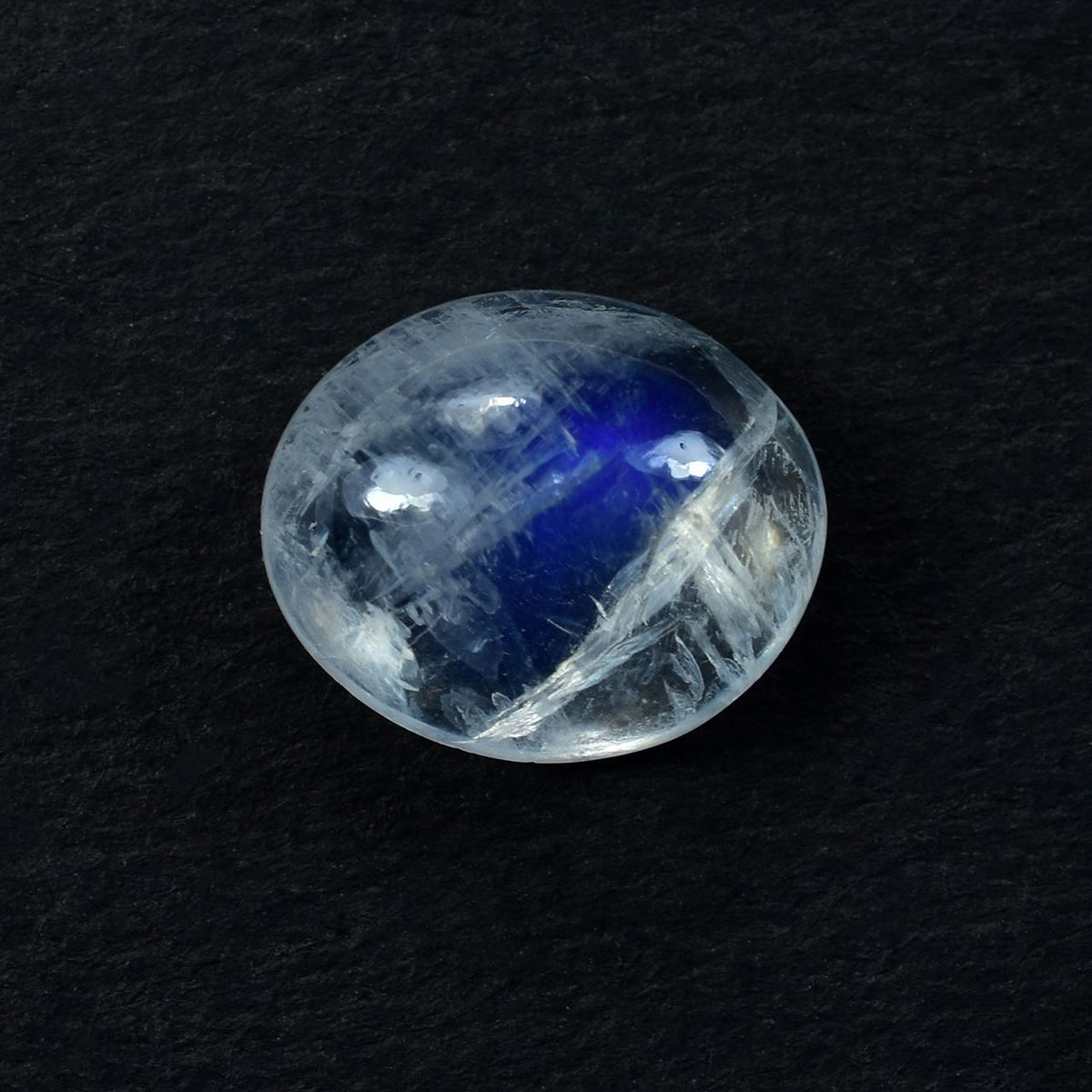 RAINBOW MOONSTONE PLAIN OVAL CAB (SEMI CLOUDY)(NICE BLUE SHINE) 12.00X10.00 MM 4.55 Cts.