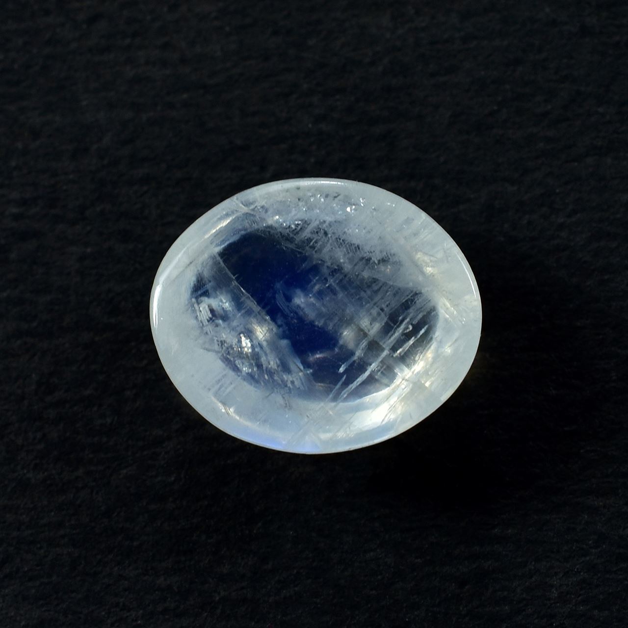 RAINBOW MOONSTONE PLAIN OVAL CAB (SEMI CLOUDY)(NICE BLUE SHINE) 12.00X10.00 MM 4.55 Cts.