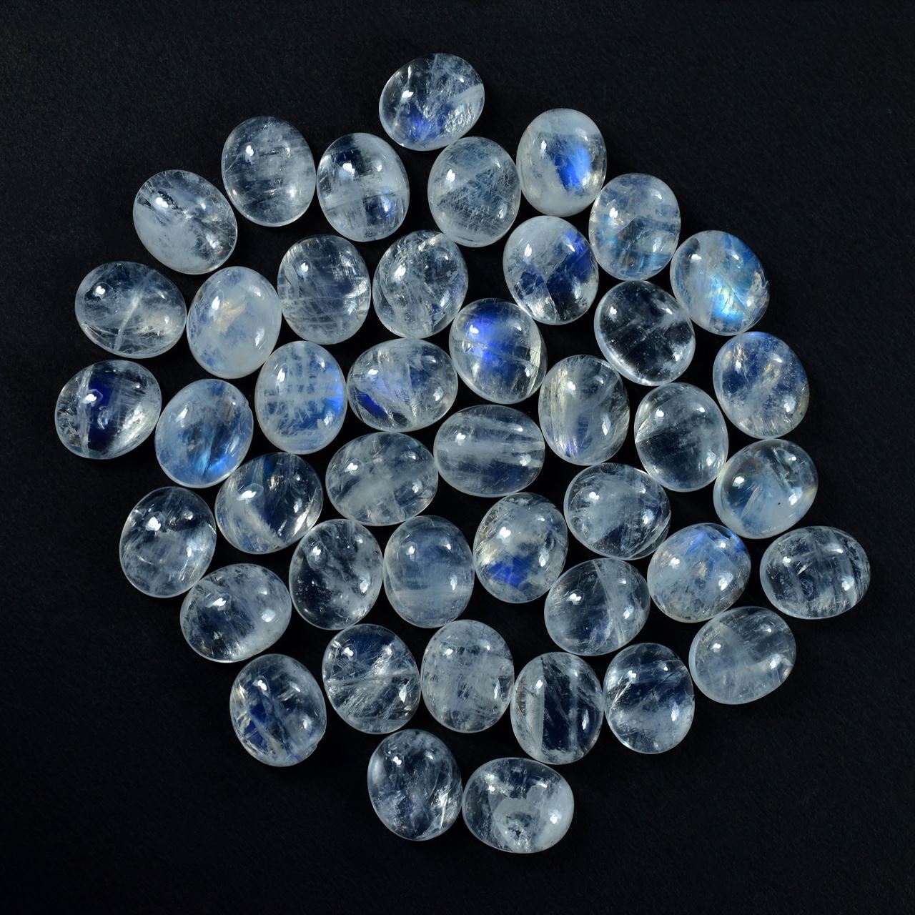 RAINBOW MOONSTONE PLAIN OVAL CAB (SEMI CLOUDY)(NICE BLUE SHINE) 12.00X10.00 MM 4.55 Cts.