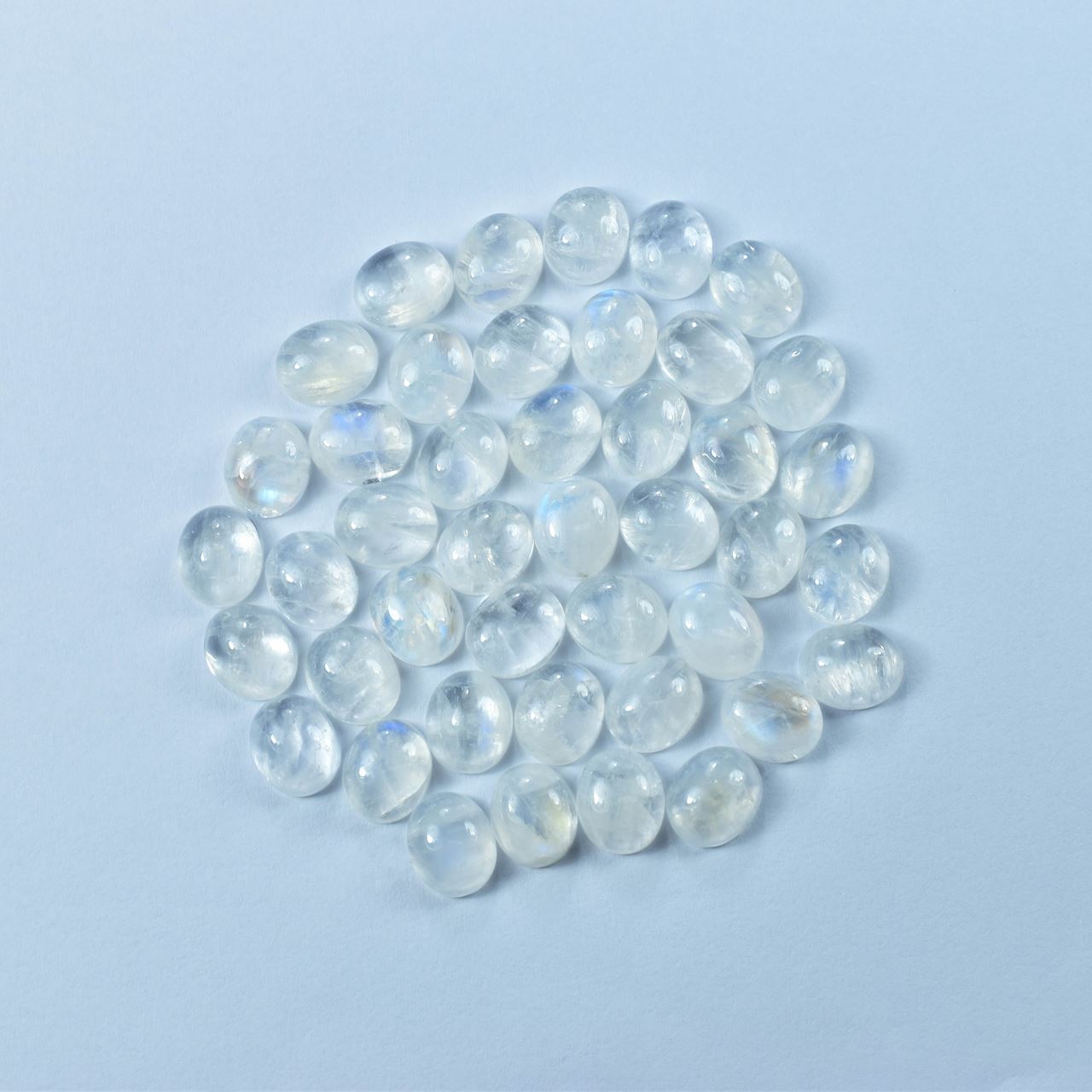 RAINBOW MOONSTONE PLAIN OVAL CAB (SEMI CLOUDY)(NICE BLUE SHINE) 12.00X10.00 MM 4.55 Cts.