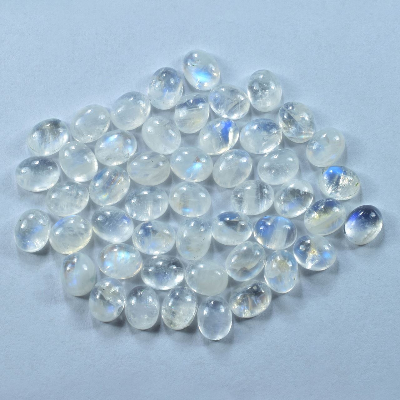 RAINBOW MOONSTONE PLAIN OVAL CAB (SEMI CLOUDY)(CLEAN) 10.00X8.00 MM 2.82 Cts.