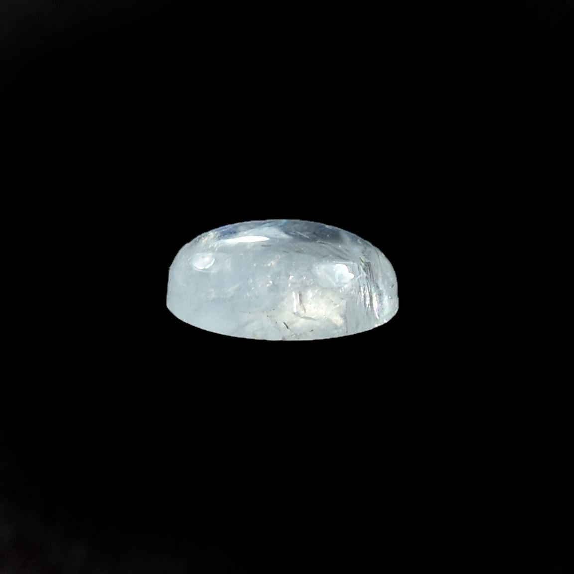 RAINBOW MOONSTONE PLAIN OVAL CAB (SEMI CLOUDY)(NICE BLUE SHINE) 7.00X5.00 MM 0.81 Cts.