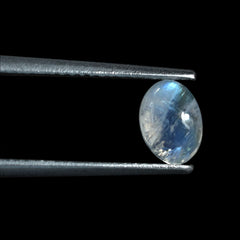 RAINBOW MOONSTONE PLAIN OVAL CAB (SEMI CLOUDY)(NICE BLUE SHINE) 7.00X5.00 MM 0.81 Cts.