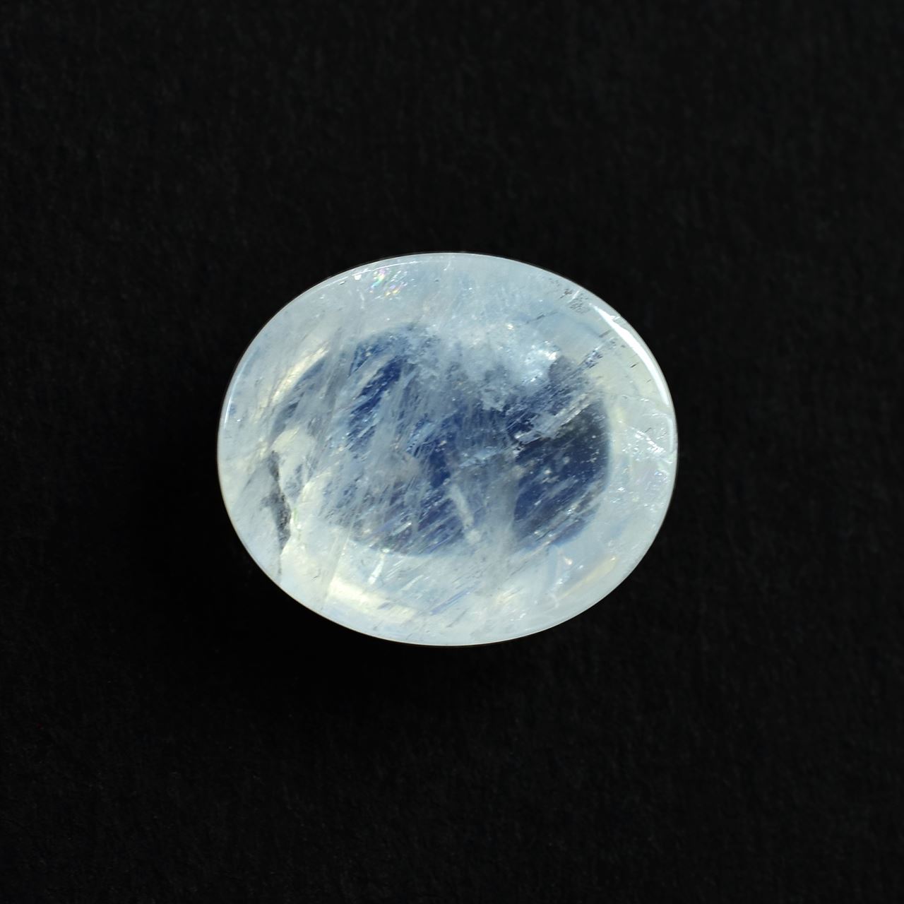 RAINBOW MOONSTONE PLAIN OVAL CAB (SEMI CLOUDY)(HI) 14.00X12.00 MM 7.54 Cts.