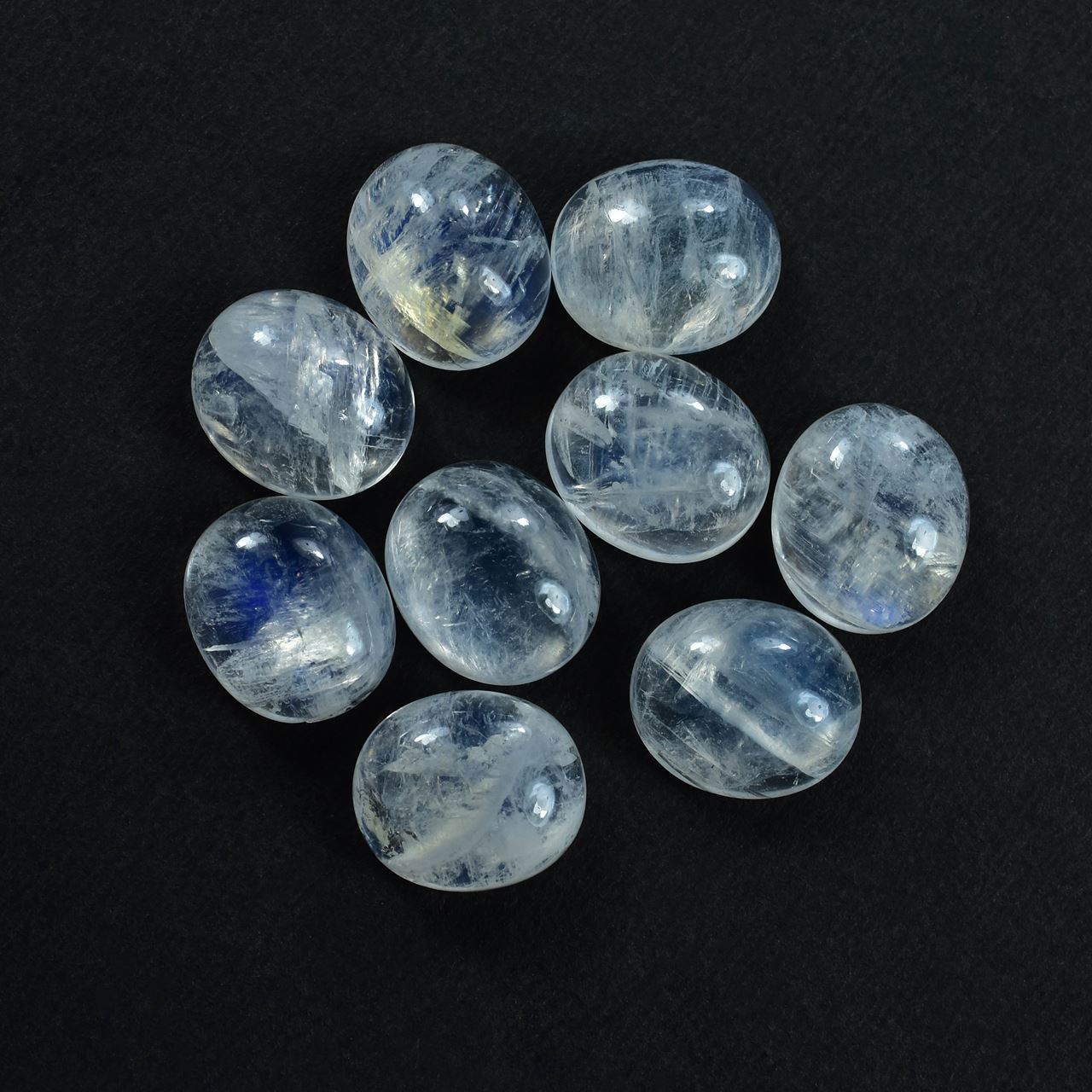 RAINBOW MOONSTONE PLAIN OVAL CAB (SEMI CLOUDY)(HI) 14.00X12.00 MM 7.54 Cts.