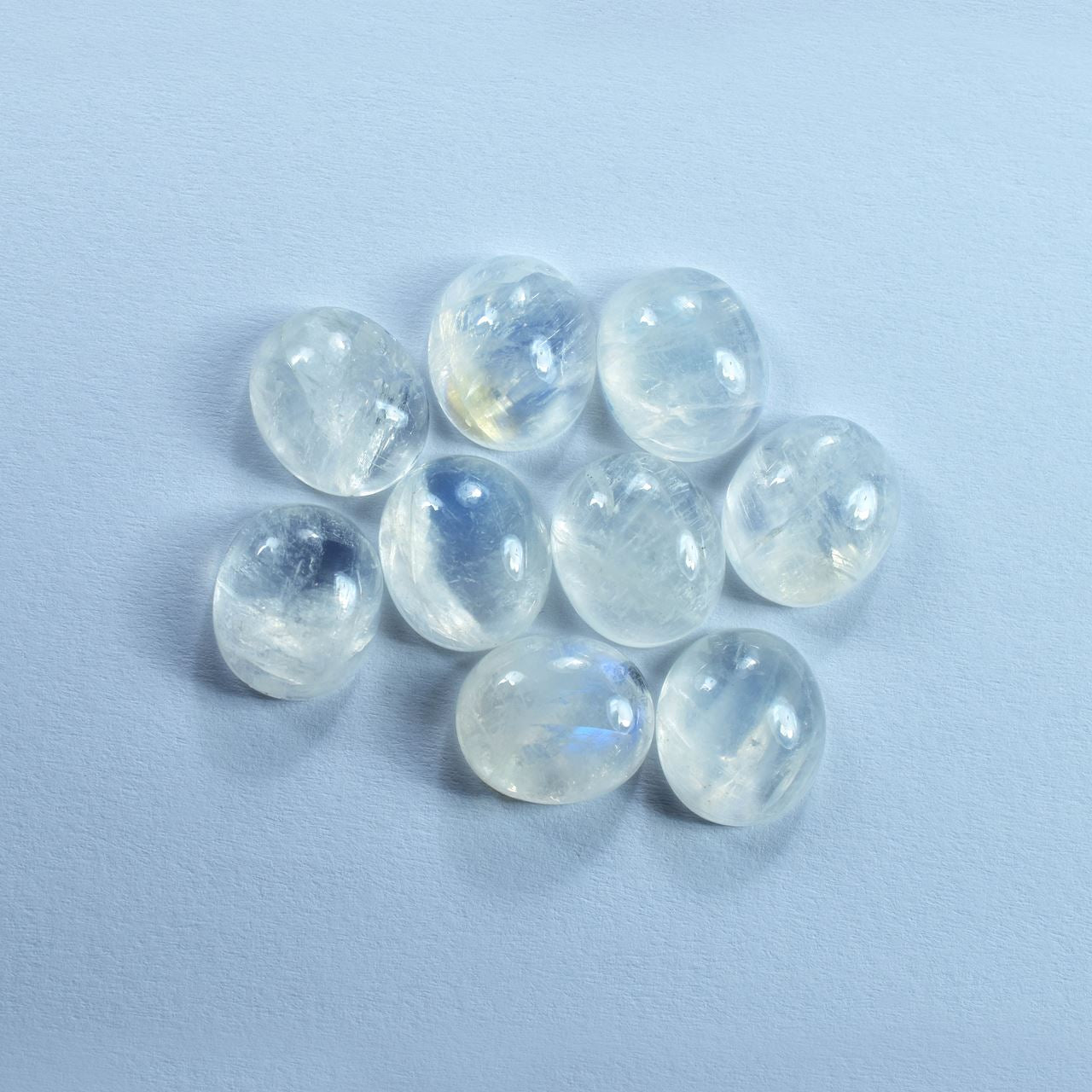 RAINBOW MOONSTONE PLAIN OVAL CAB (SEMI CLOUDY)(HI) 14.00X12.00 MM 7.54 Cts.