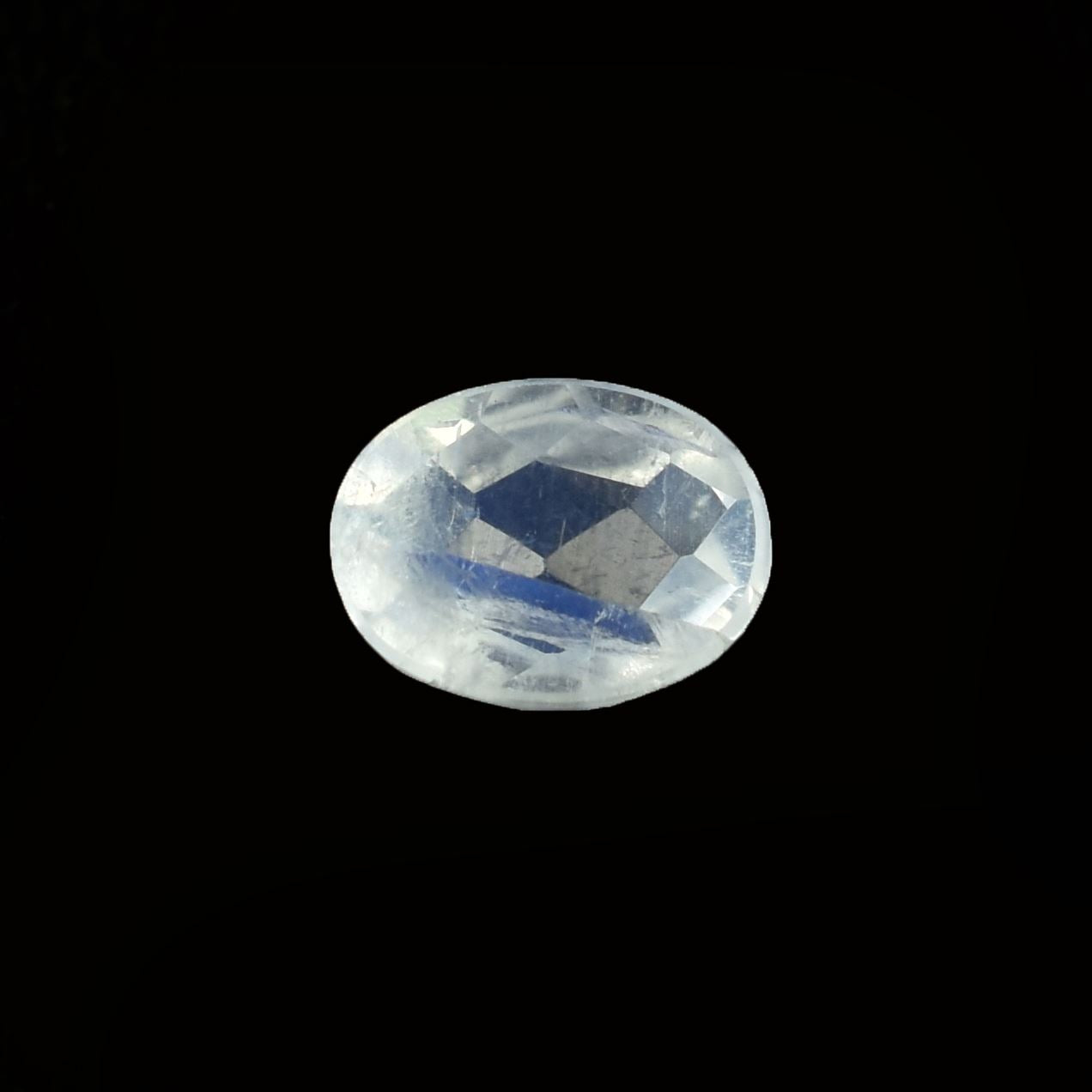 RAINBOW MOONSTONE CHECKER CUT OVAL CAB (SEMI CLOUDY)(NICE BLUE SHINE) 8.00X6.00 MM 1.22 Cts.