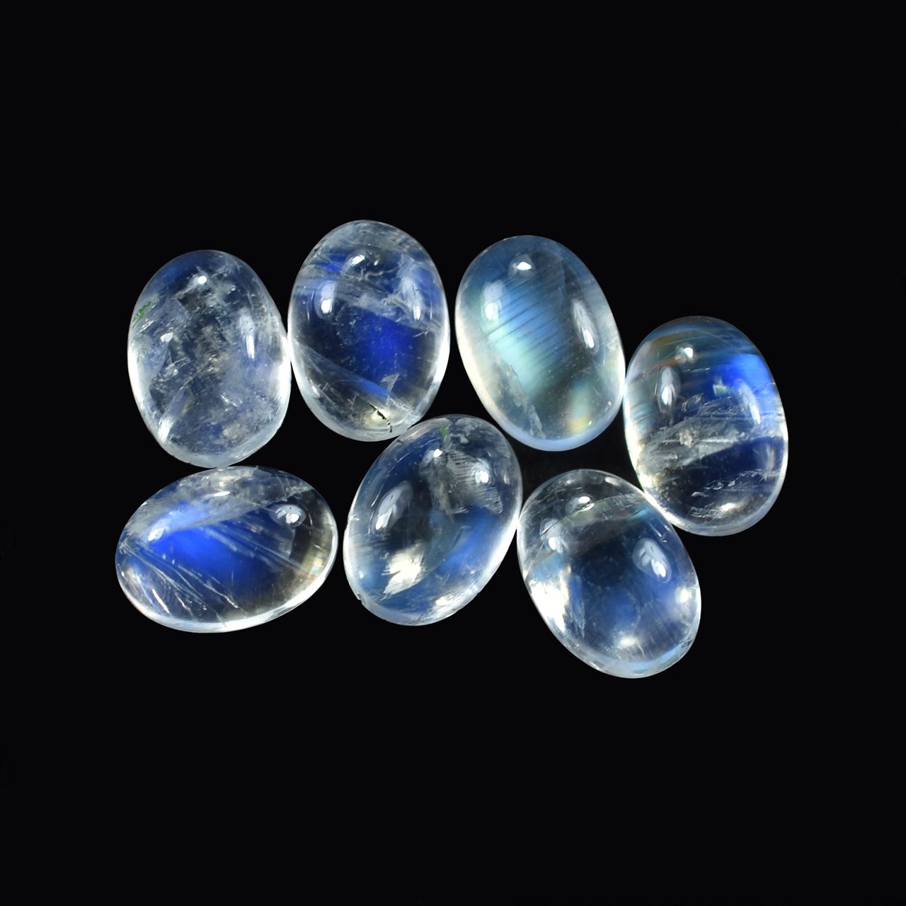 RAINBOW MOONSTONE PLAIN OVAL CAB (SEMI CLOUDY)(HI) 7.00X5.00 MM 0.87 Cts.