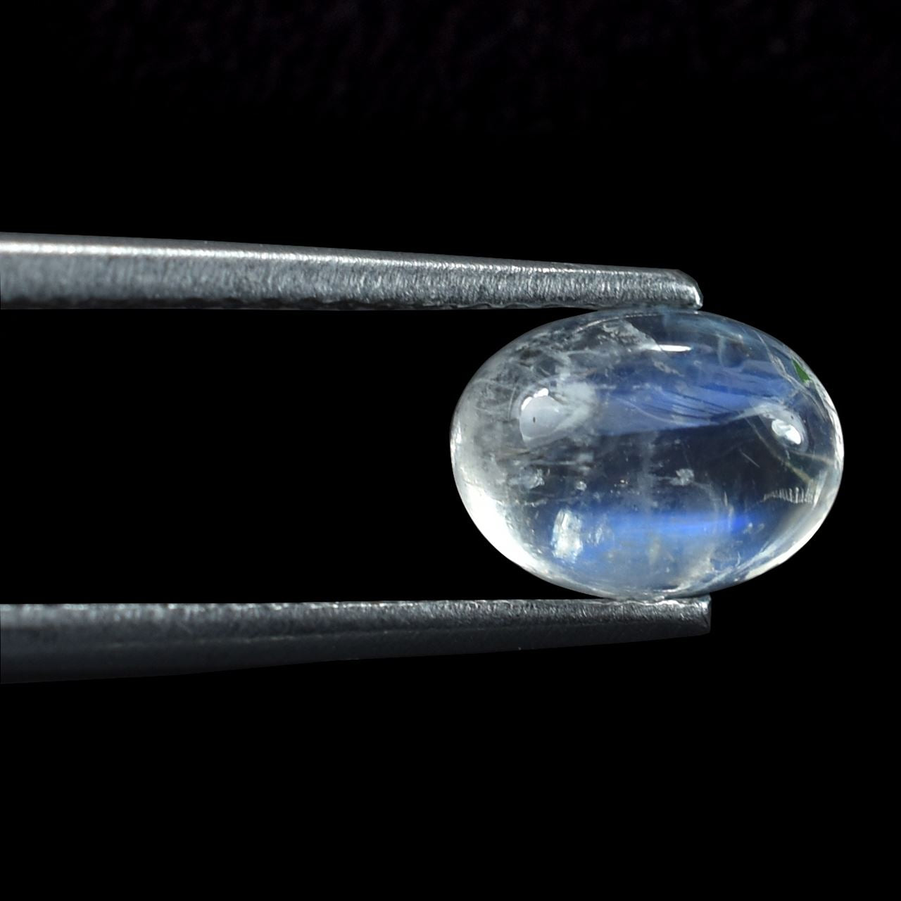 RAINBOW MOONSTONE PLAIN OVAL CAB (SEMI CLOUDY) 8.00X6.00 MM 1.37 Cts.