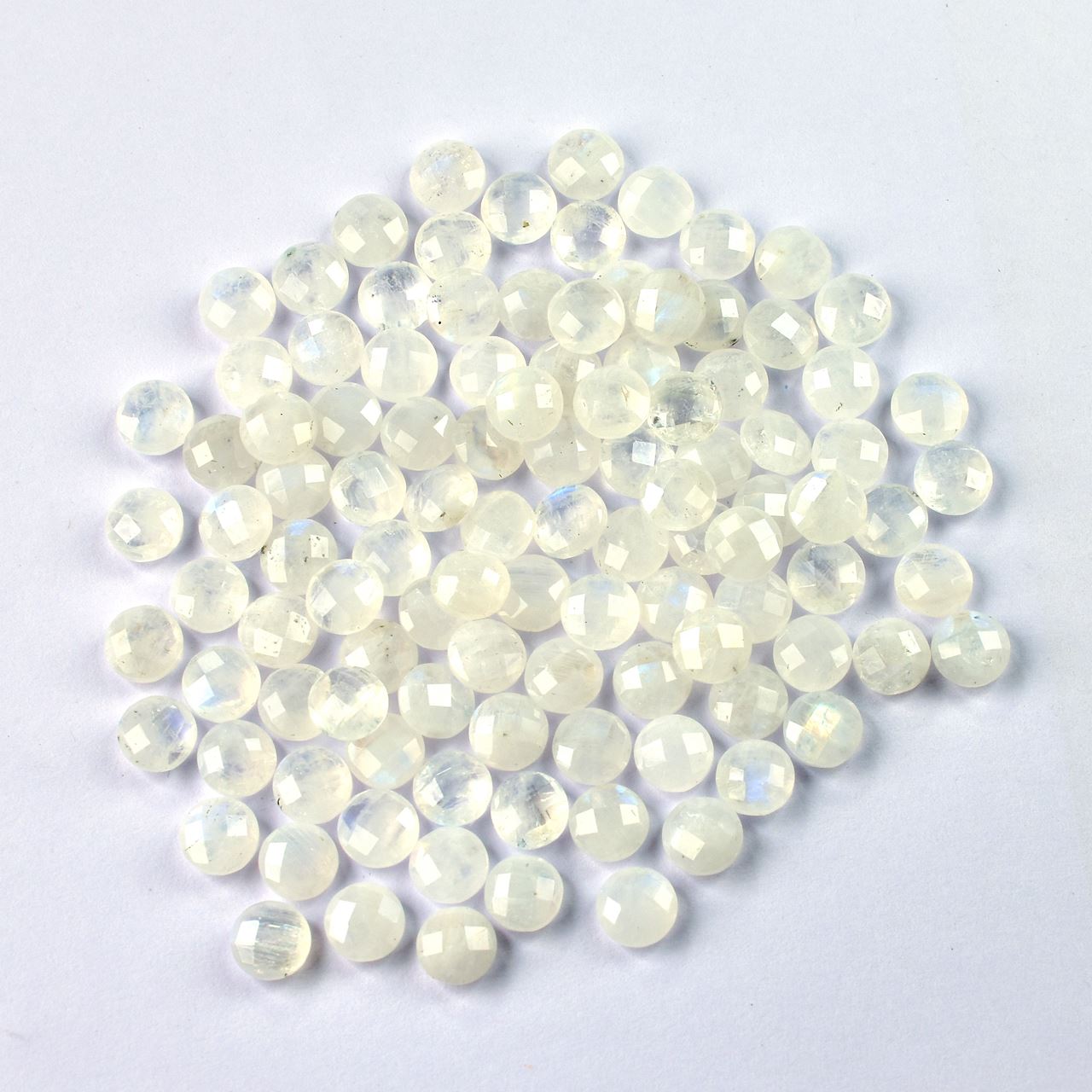 RAINBOW MOONSTONE CHECKER CUT ROUND CAB (CLOUDY) 7.00X7.00 MM 1.19 Cts.