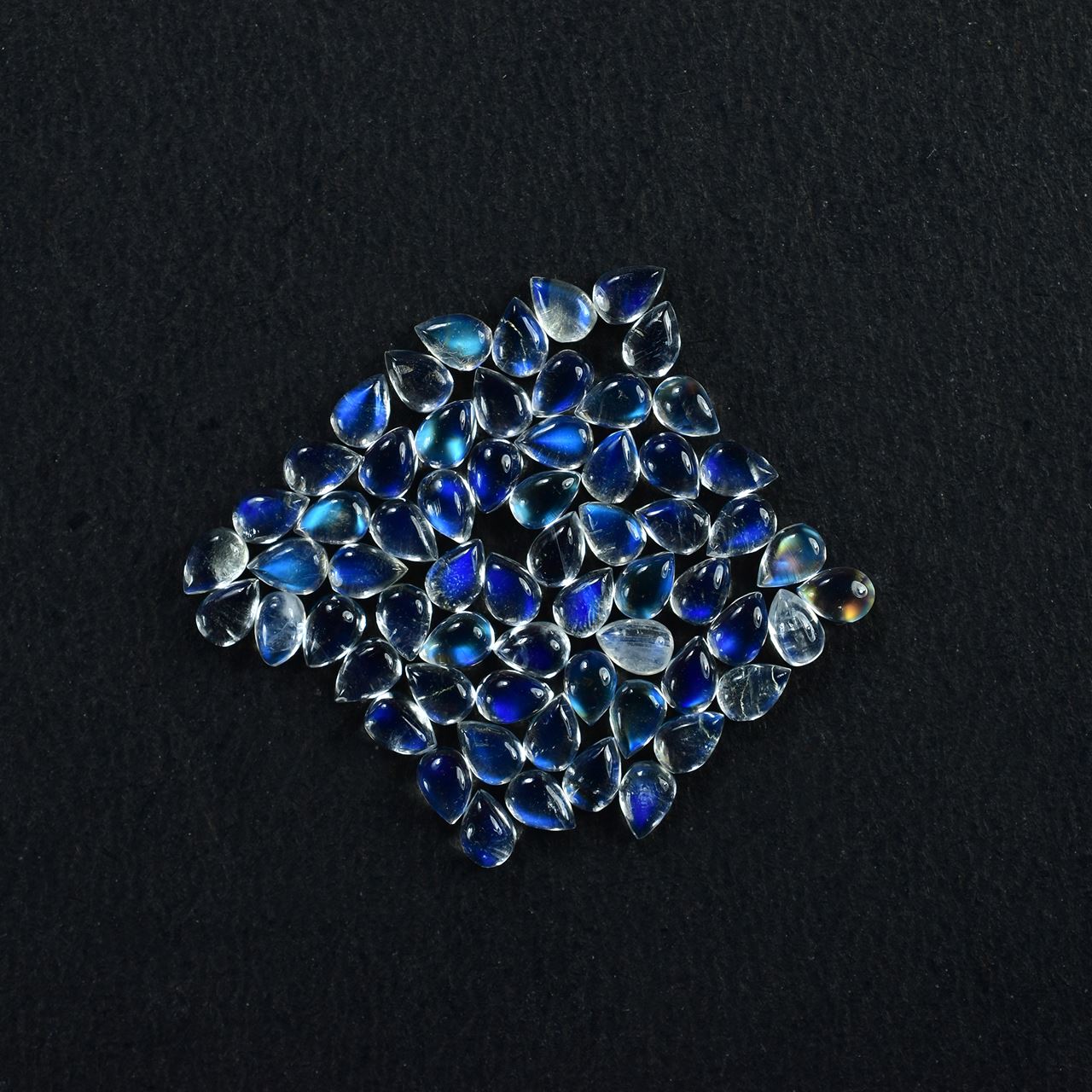 RAINBOW MOONSTONE PEAR CAB (CLEAN TO VSI) 3.00X2.00 MM 0.07 Cts.