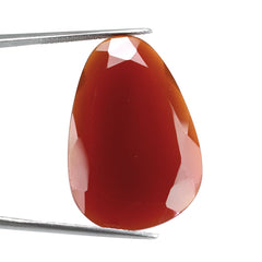 RED ONYX STEP CUT IRREGULAR PEARISH 32X21.50MM 21.79 Cts.