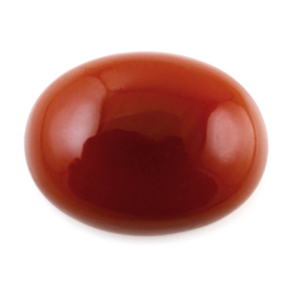RED ONYX OVAL CAB 23X17MM 24.28 Cts.