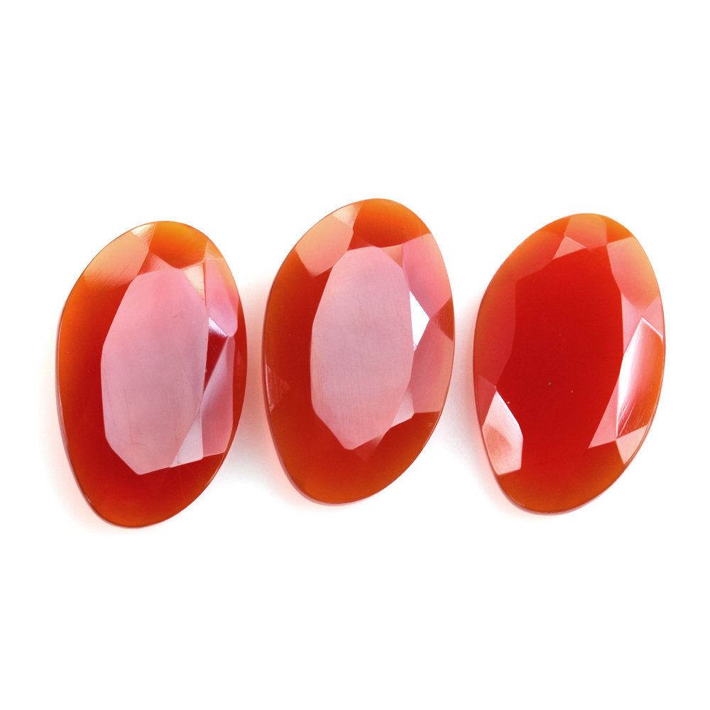 RED ONYX CUT IRREGULAR OVAL 22X14MM 9.19 Cts.