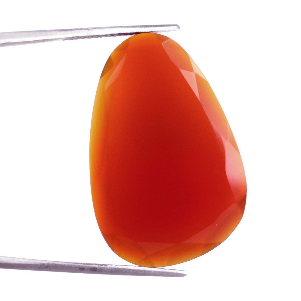 RED ONYX STEP CUT IRREGULAR PEAR 32X22MM 22.30 Cts.