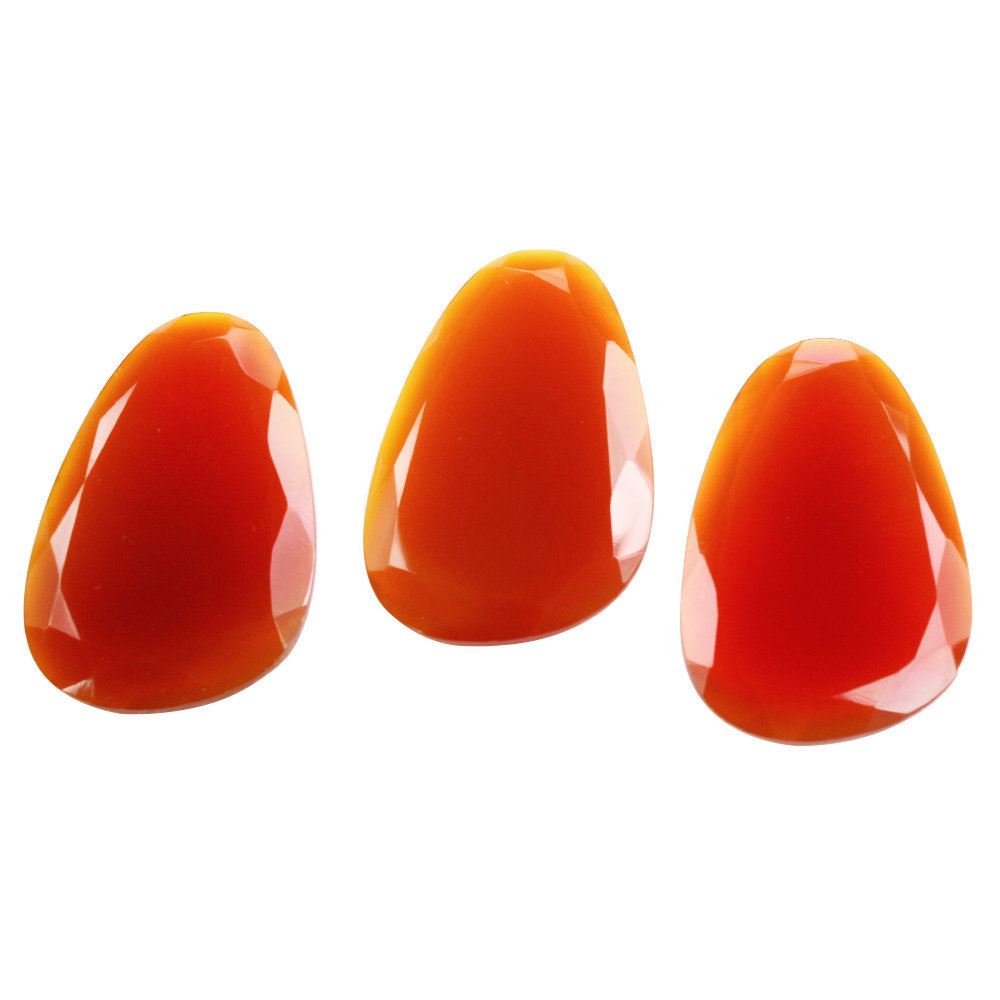 RED ONYX STEP CUT IRREGULAR PEAR 32X22MM 22.30 Cts.