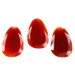 RED ONYX STEP CUT IRREGULAR PEAR 32X22MM 22.44 Cts.