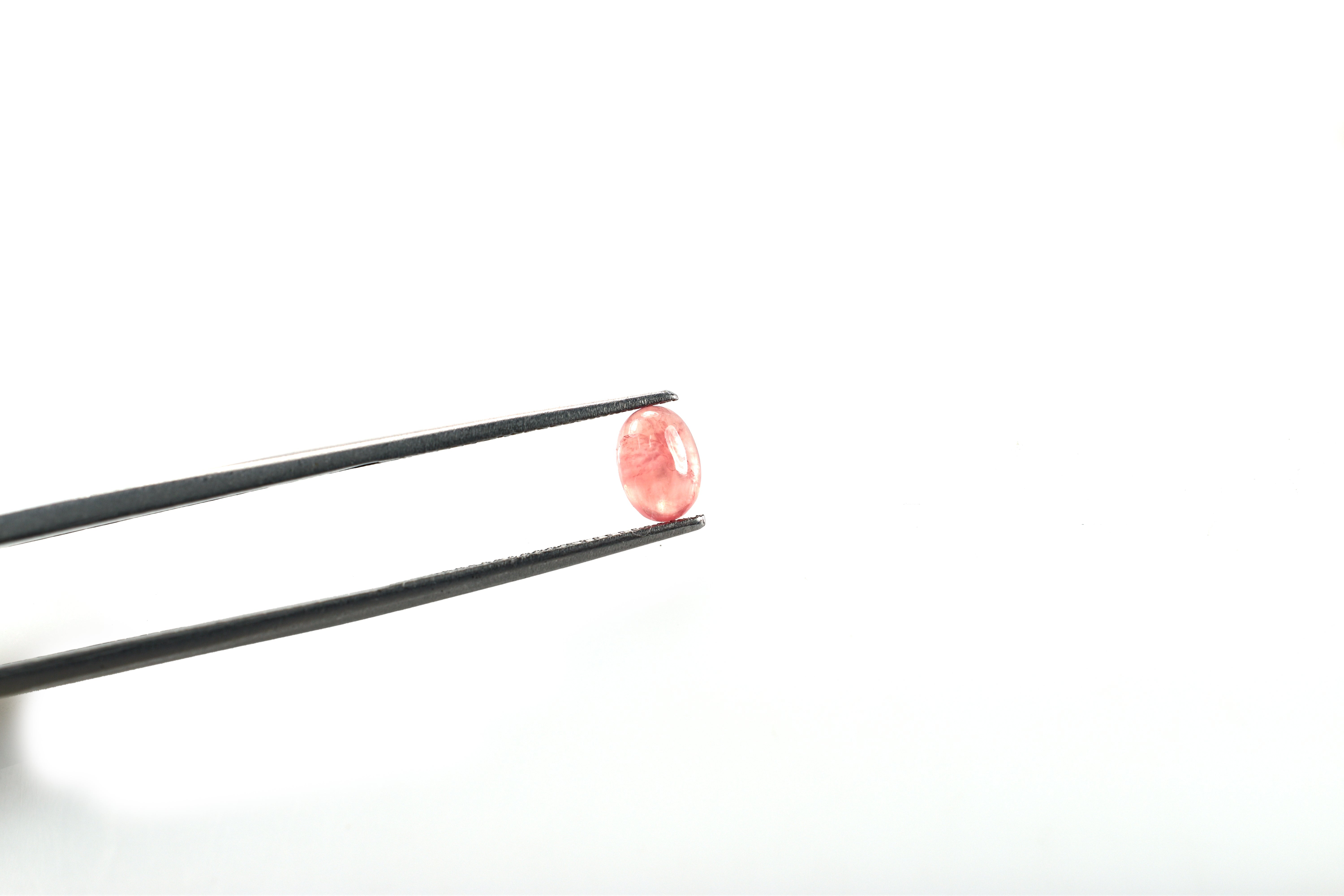 RHODOCHROSITE CLEAN PLAIN OVAL CAB (PINKISH RED/CELAN) 7.00X5.00 MM 0.98 CTS