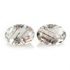 RED RUTILE QUARTZ CUT OVAL 7X5MM 0.70 Cts.
