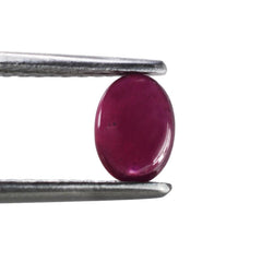 GLASSFILLED RUBY OVAL CAB 7X5MM 1.04 Cts.