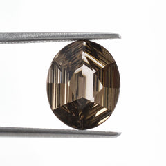 SMOKY QUARTZ SWIRL CUT HEXAGON CONCAVE OVAL 12X10MM 3.98Cts.