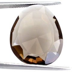 SMOKY QUARTZ CUT IRREGULAR OVAL STEP CUT BACK 23X18MM 13.10 Cts.