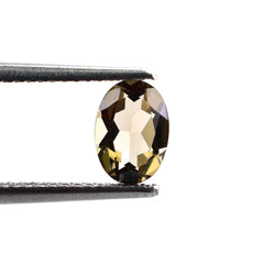 SMOKY QUARTZ CUT OVAL (LITE) 7X5MM 0.69 Cts.